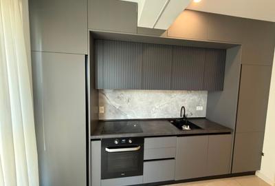 Apartament cu 3 camere semidecomandat, mobilat în Central