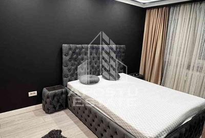 Apartament cu 2 camere semidecomandat, mobilat în Central