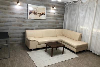 Apartament cu 2 camere semidecomandat, mobilat în Central
