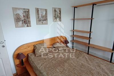 Apartament cu 3 camere semidecomandat, mobilat în Torontalului
