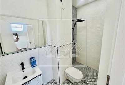 Penthouse nou  - 2 camere, 2 bai si balcon - intabulat - 8