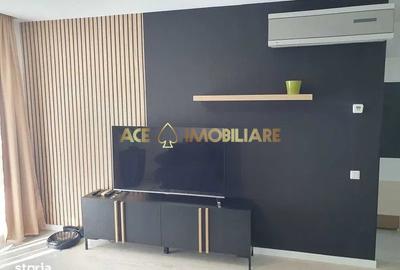 Apartament cu 2 camere semidecomandat, mobilat în Costin Georgian
