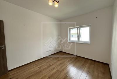 Apartament cu 3 camere, 56,6 mp utili, balcon de 7 mp - Calea Cisnadiei - 12