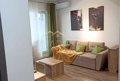 Apartament cu 2 camere semidecomandat, mobilat în Regie
