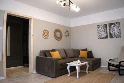Apartament cu 2 camere semidecomandat, mobilat în 1 Mai
