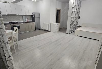Garsoniera,48 m[ utili total.mobilata si utilata modern,loc parcare,Otopeni.