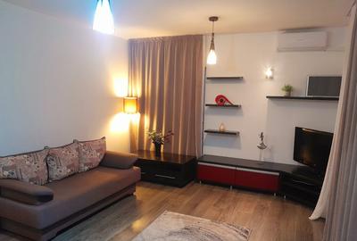 Apartament cu 2 camere semidecomandat, mobilat în Titan