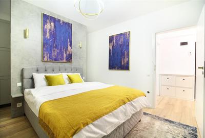 Apartament cu 2 camere semidecomandat, mobilat în Central