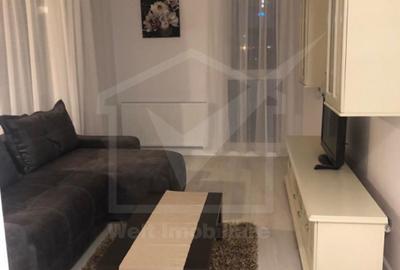 Apartament cu 2 camere semidecomandat, mobilat în Central