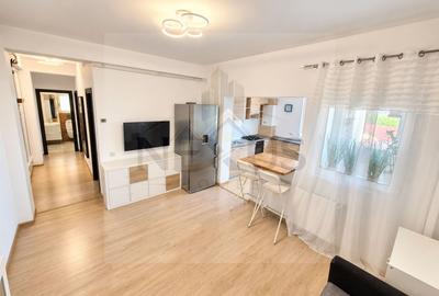 Apartament cu 3 camere semidecomandat, mobilat în Sud
