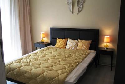 Apartament cu 2 camere semidecomandat, mobilat în Centrul Civic