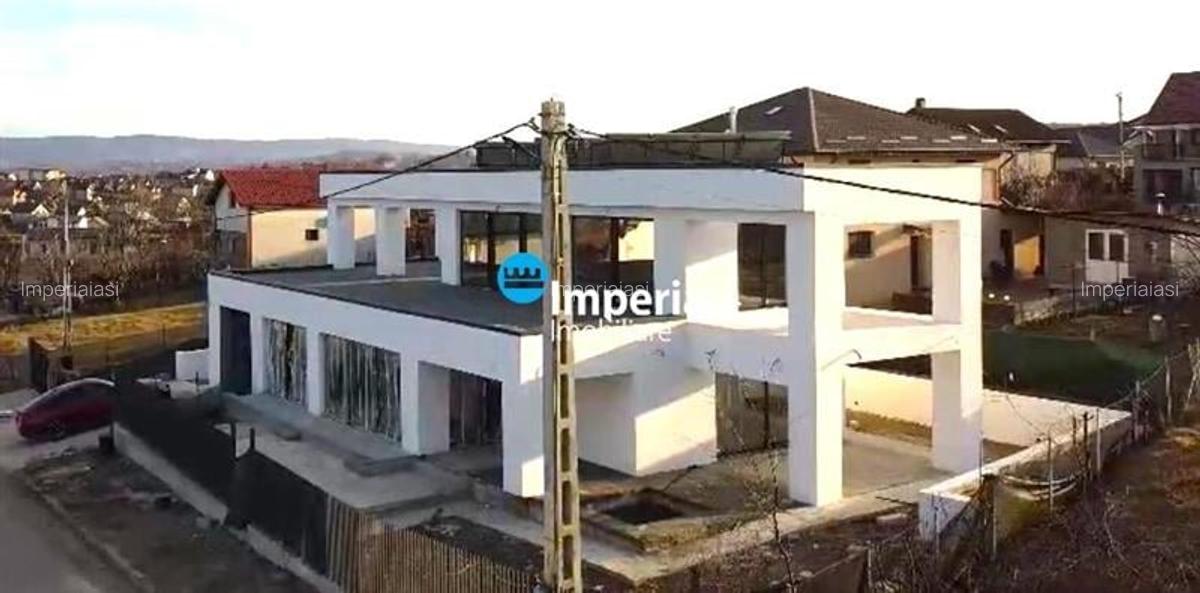 Casa eficienta energetic, cu sistem trifazat EV si tehnologii de top  Vedere la - 1