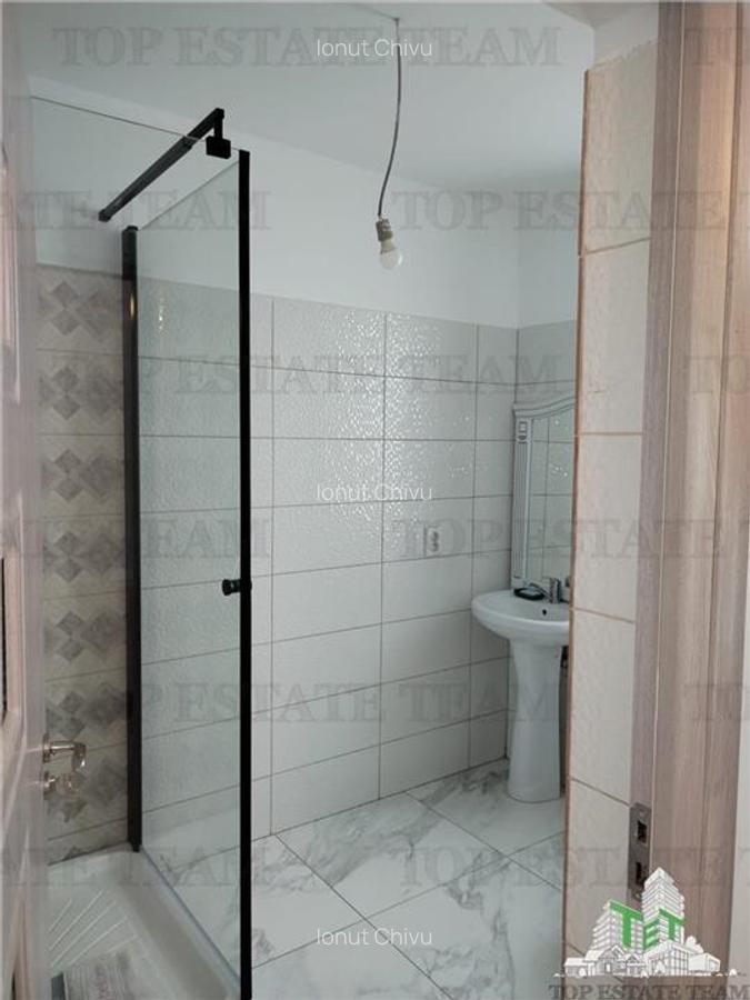 Vila individuala cu 5 camere,  2 terase, 4 locuri de parcare,350mp teren imprejm - 14