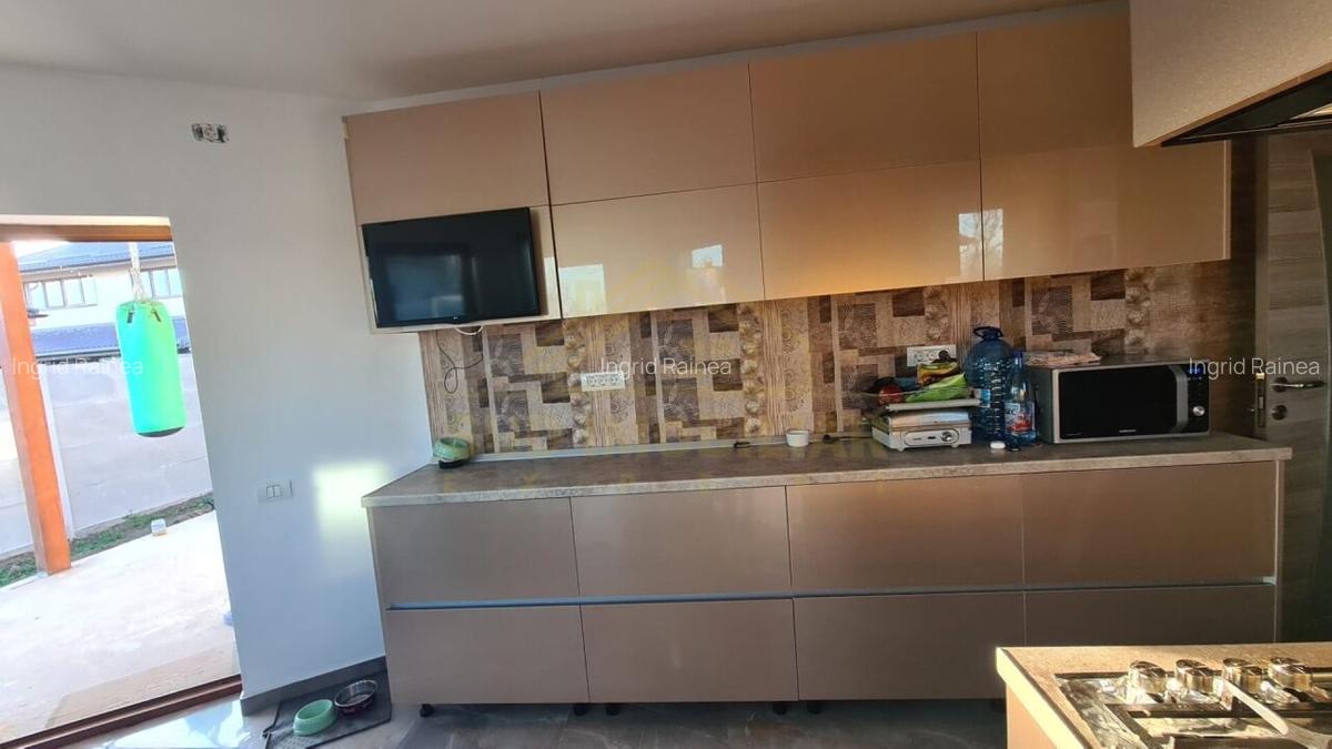 Casa individuala P+1+pod Comuna  Berceni-Str.1 Decembrie -teren 450mp - 14