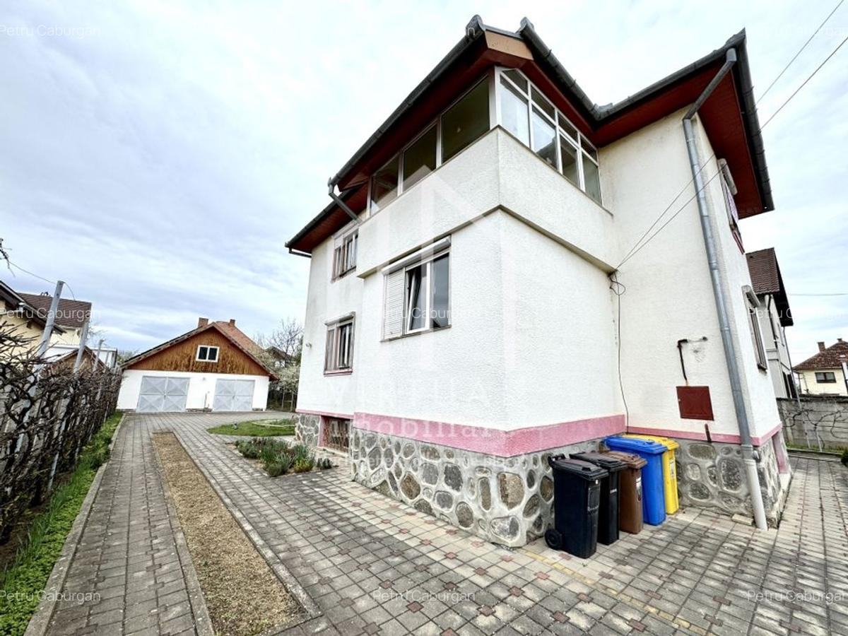 Casa individuala cu 6 camere + demisol 94mp utili, teren 972mp, garaje - 3