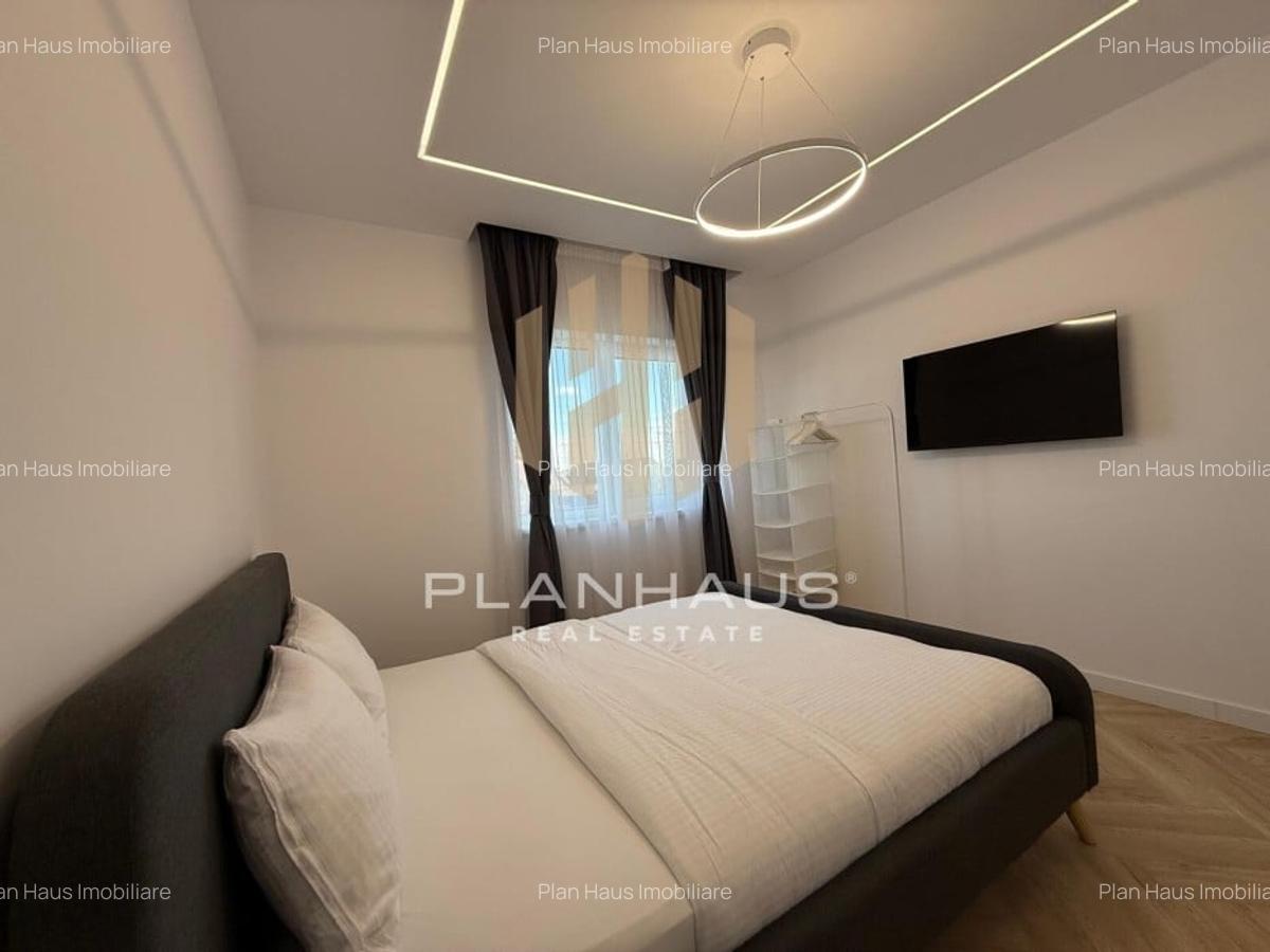 Inchiriere-ultramodern apartament zona rezidentiala ,3 camere,etaj 1,loc de parc - 13