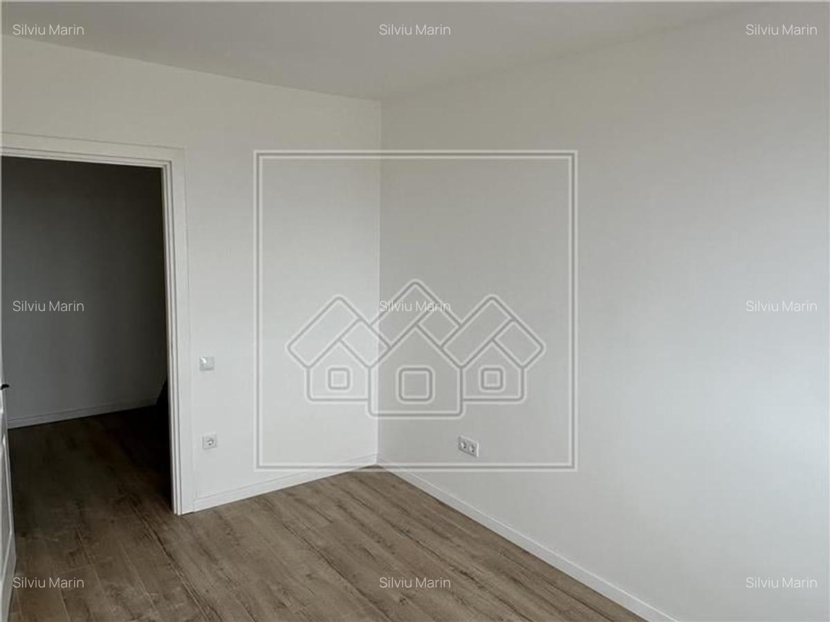 Apartament in Sibiu - 3 camere, decomandat, etaj intermediar - 12