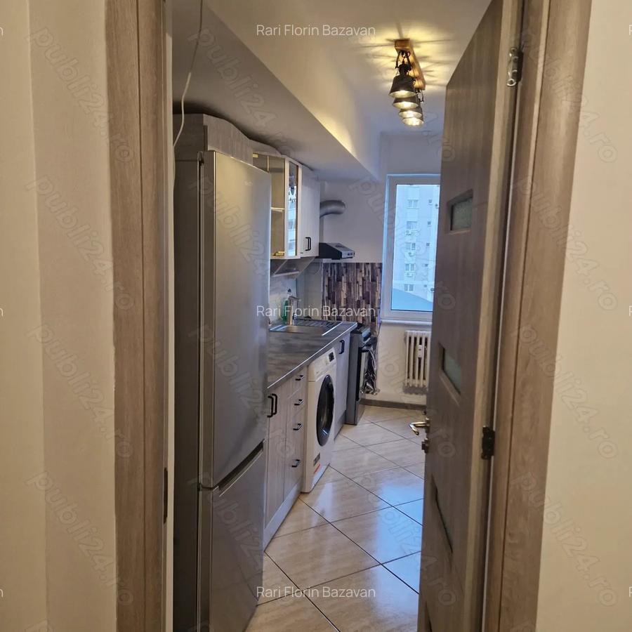 Inchiriez apartament 2 camere in regim hotelier, Craiova, str A.I Cuza , bl Patria , sc B , ultracen - 5