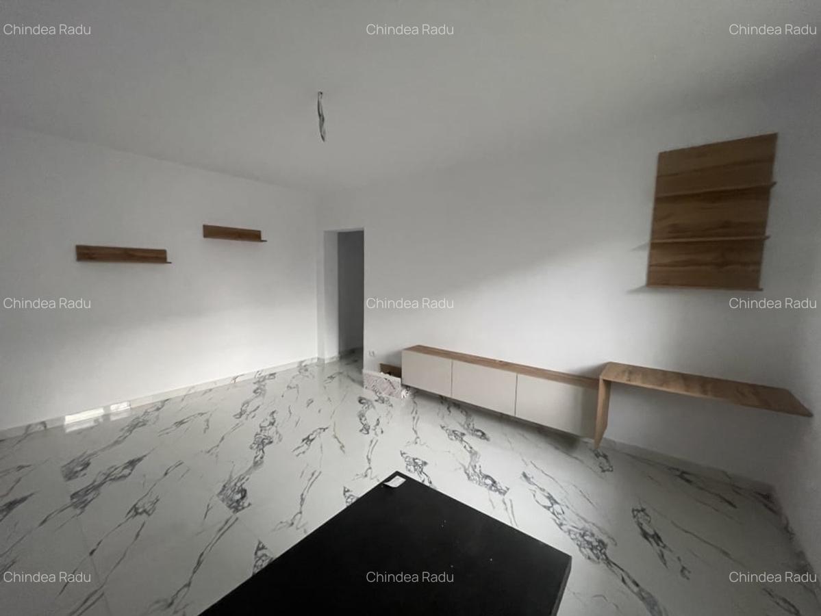 Apartament la parter in bloc nou //  2 camere decomandat. - 4