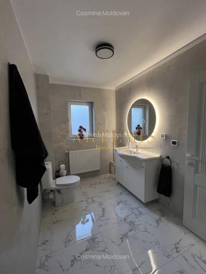 Casa individuala, decomandata,  4 camere, 250 mp., teren 1600 mp., zona Centura - 11