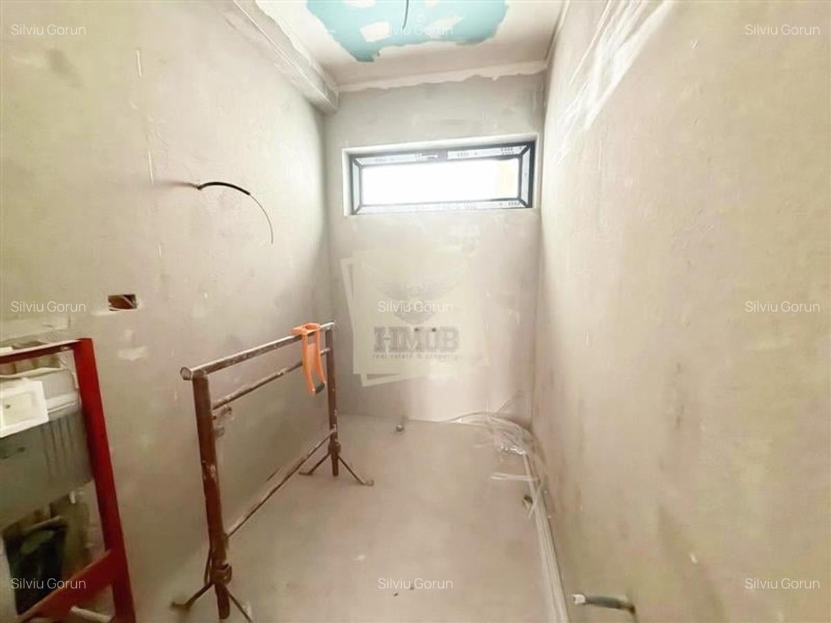 Casa individuala cu 4 camere 3 bai si 390 mp teren in Sura Mica - 17