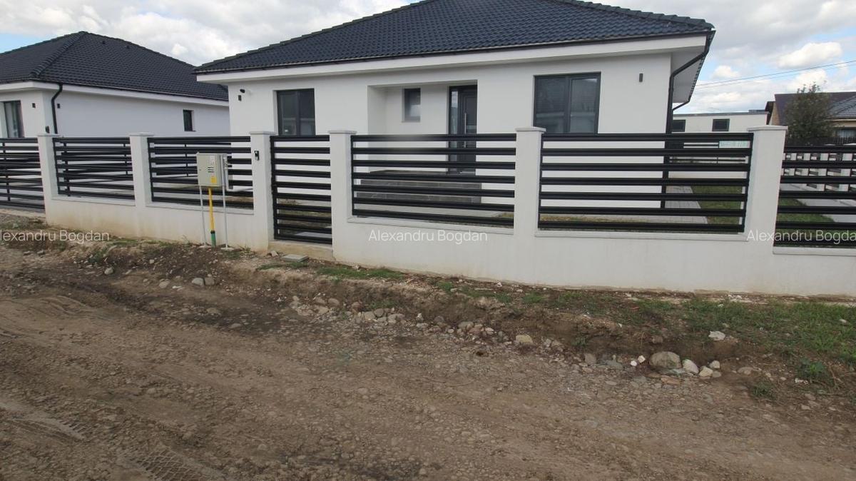 Casă 4 cam,2 băi,terasă acoperită,500mp.teren,gard,pavaj. - 10