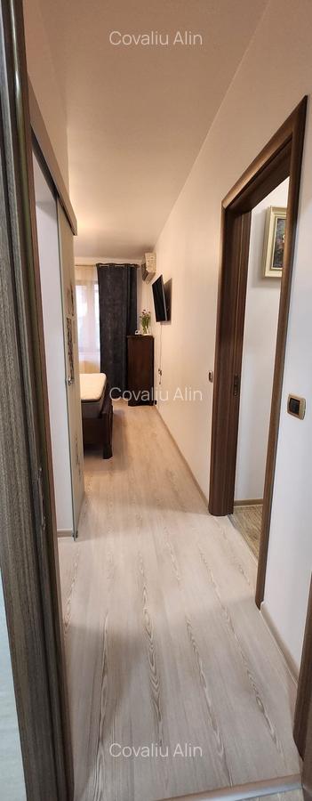 Apartament 2 camere, 2 grupuri sanitare, loc parcare, situat in Tractorul - 15