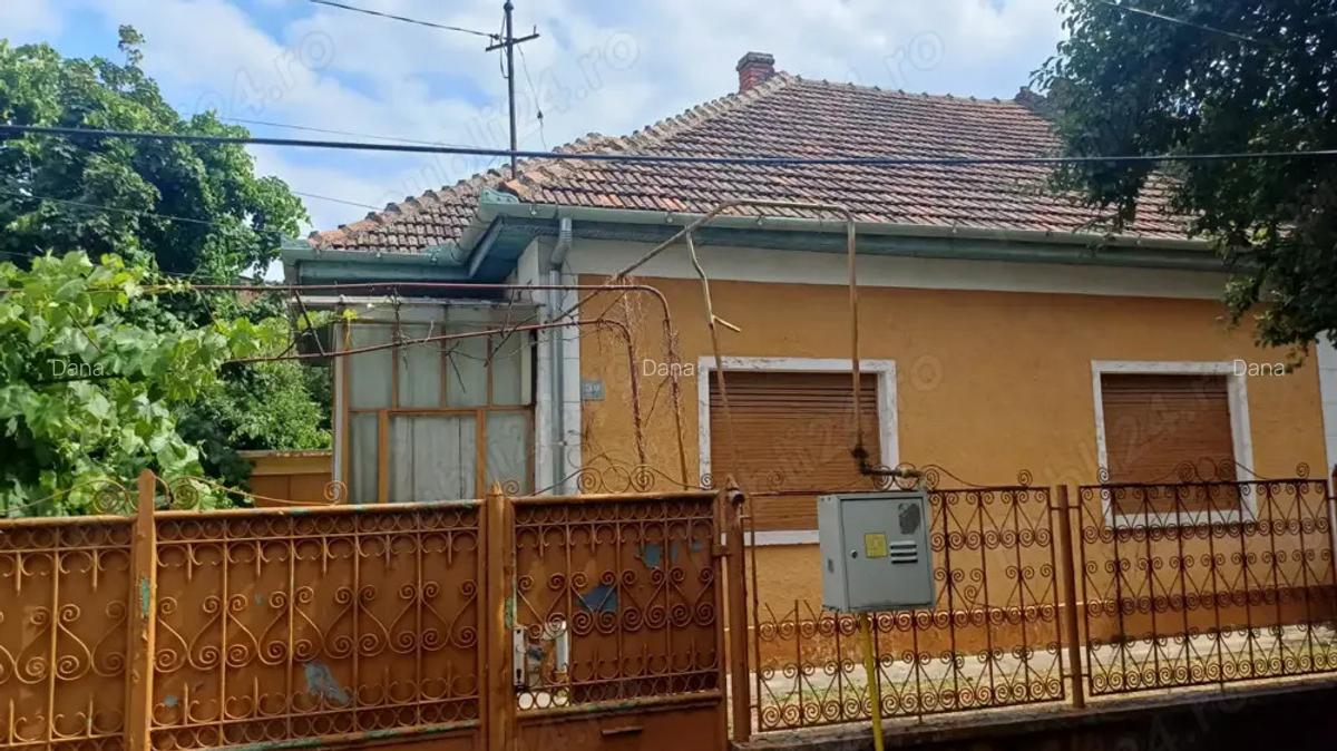 Casa individuala pe parter - 124 mp, 4 camere, anexe si garaj, teren 614 mp, -Str.Dr.I.Muresan - 1
