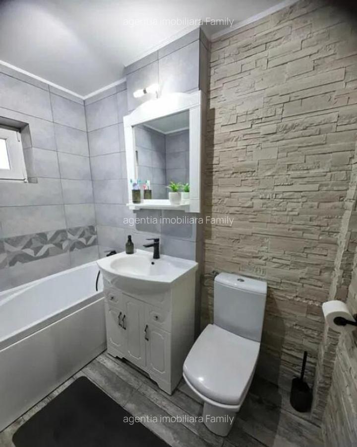 Apartament Cu 3 Camere Decomandate Zona Burdujeni - Cuza Voda 1 - 2