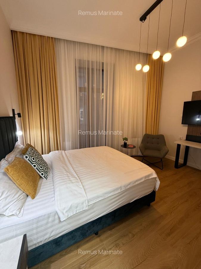 Apartament cu 5 camere decomandat, mobilat în Magheru - 9