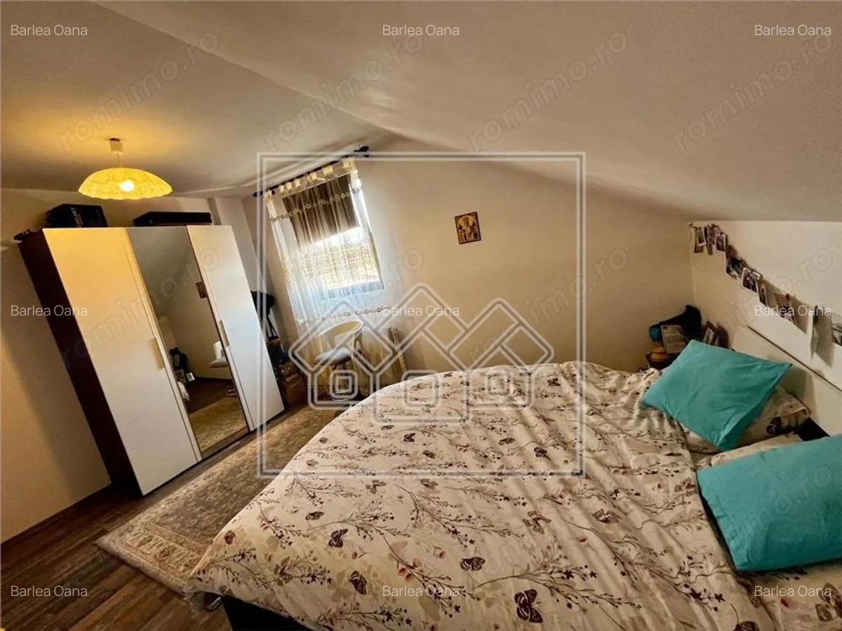 Casa individuala - teren 250 mp - pivnita si garaj - Selimbar - 19