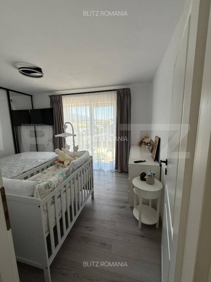 Apartament cu 3 camere, 65 mp si un foisor cu gradina de 191 mp - 4