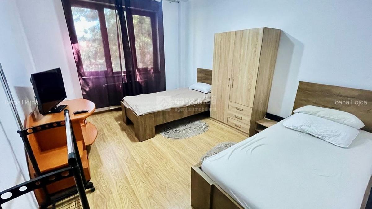 Apartament cu 4 camere decomandat, mobilat în Bucium - 9