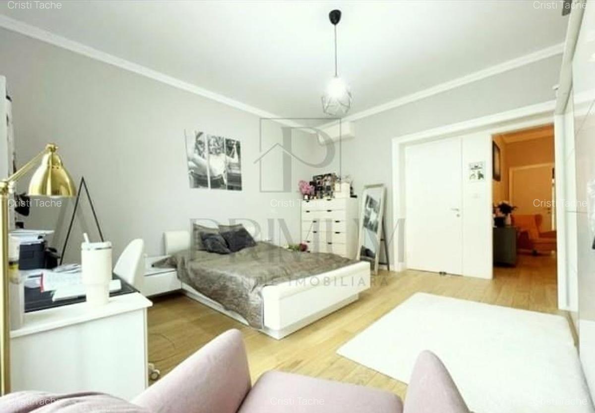 CENTRAL - ETAJ 1 - RENOVAT - 4 camere - 3 bai - centrala proprie - clima - GARAJ - 21