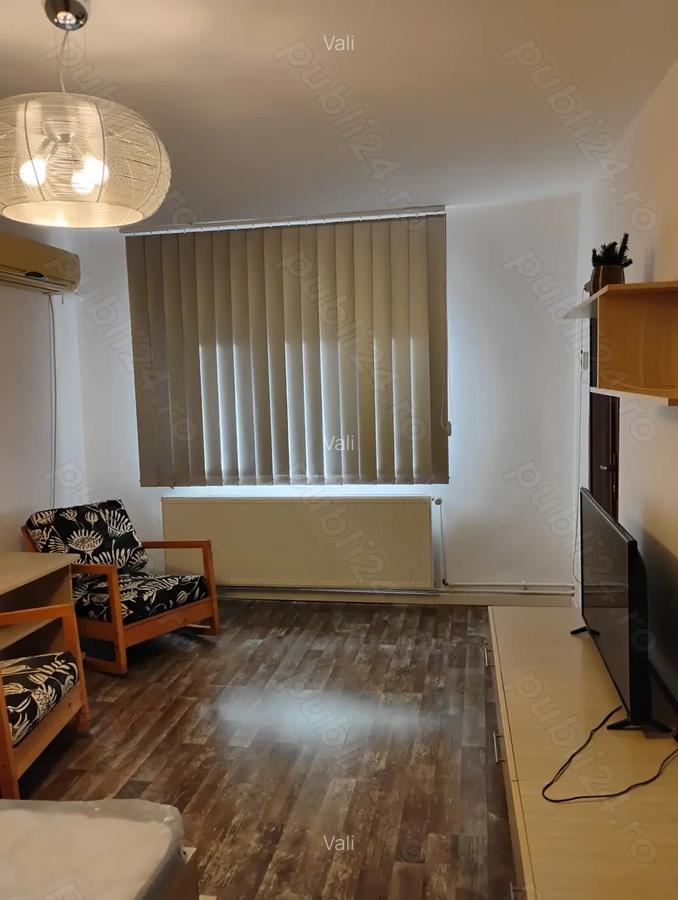 Inchiriez apartament cu 2 camere decomandat etaj 1 - 1