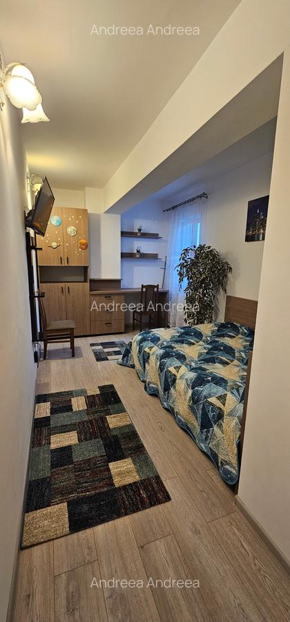 Apartament cu 3 camere de inchiriat zona Tractorul bloc nou - 23