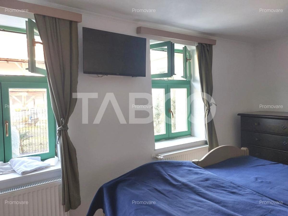 Casa de vanzare care poate fi caminul tau dar si afacerea ta Cisnadie - 9