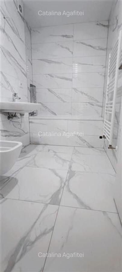 Apartament cu 3 camere decomandat în Tractorul - 15