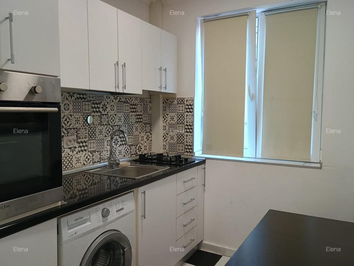 Magheru 2 camere renovat complet si mobilat - 5