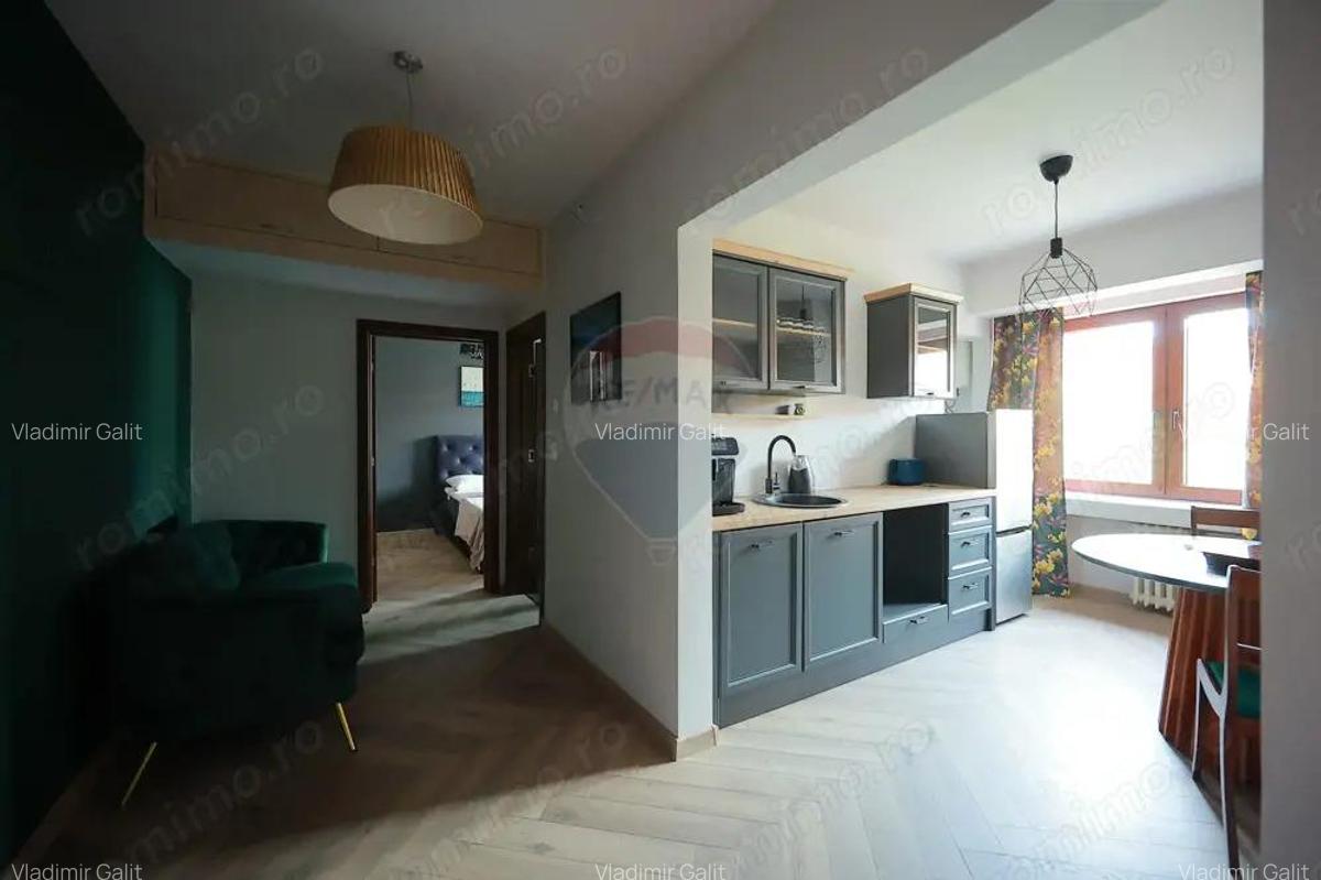 De inchiriat apartament 2 camere - ultracentral, loc de parcare,lift - 1