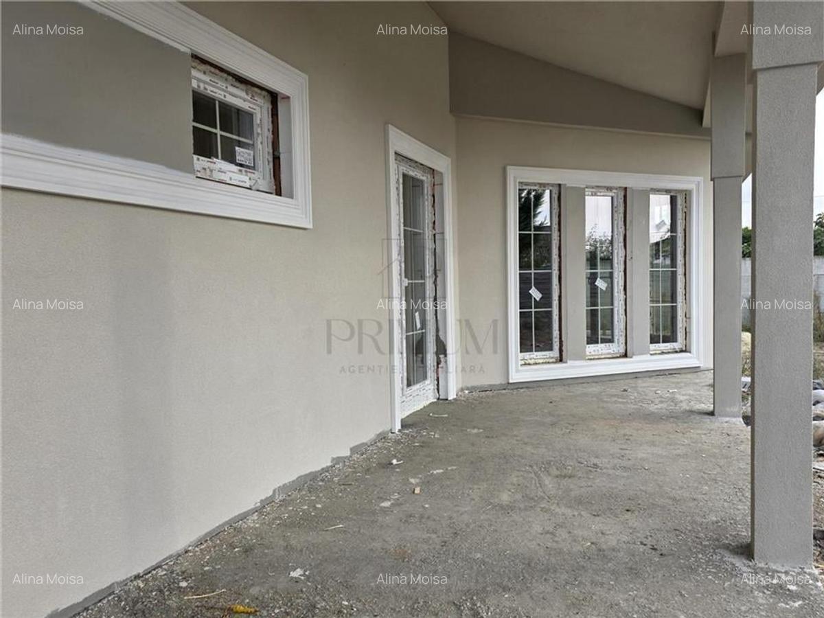 Casa individuala - teren 730 mp - garaj - 5 dormitoare - living 57 mp - 5