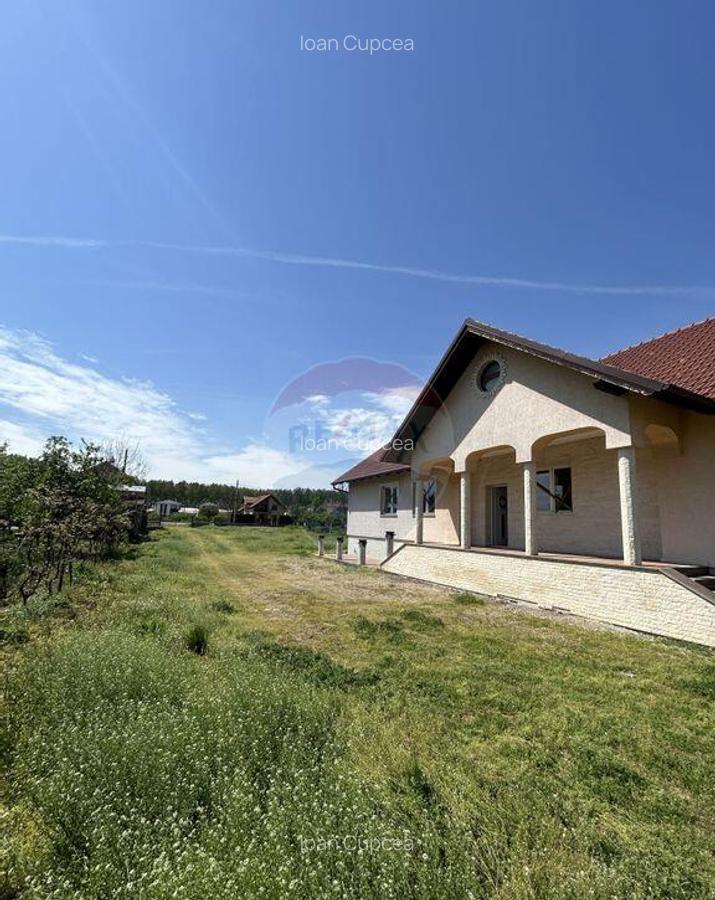 Casa cu 5 camere finisata si 10.400 m2 teren de vanzare... - 11 Casa cu 5 camere finisata si 10.400 m2 teren de vanzare... - 11