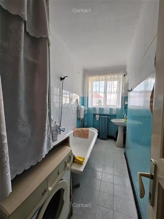 Apartament cu GRADINA SI ACOPERIS  MANSARDA DE VANZARE IN ONESTI ETJ 1 - 10
