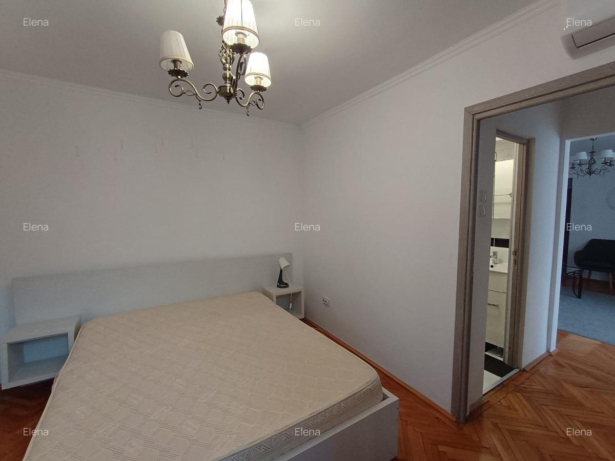 Magheru 2 camere renovat complet si mobilat - 13
