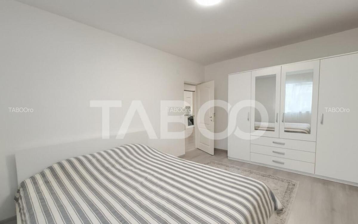 Apartament de vanzare 3 camere 2 bai gradina 74mp si parcare - 2