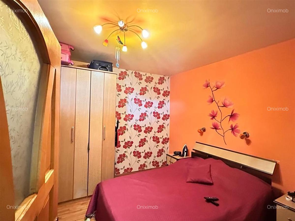 Casa batraneasca, zona  Buna Vestire  Ploiesti, teren 175 mp,renovata in 2004 - 5