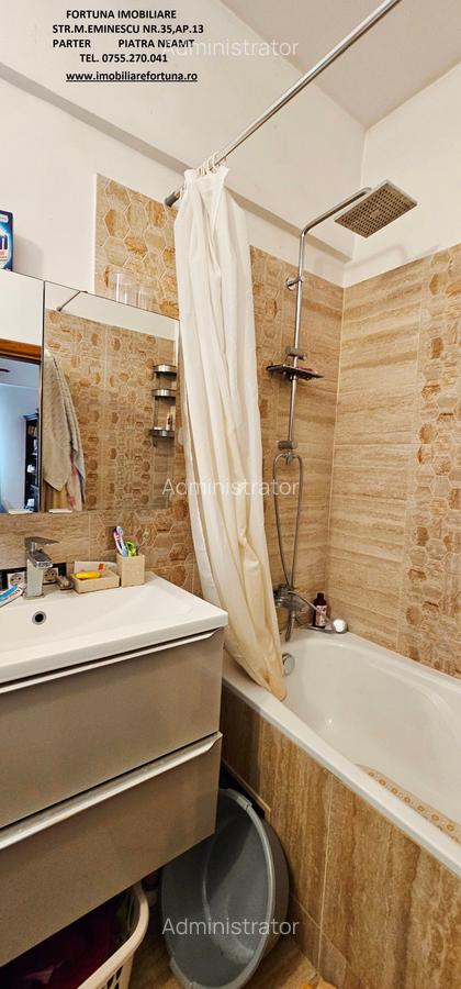 Locuinta individuala(apartament 4 camere)+spatiu comercial si teren ,Darmanesti - 9