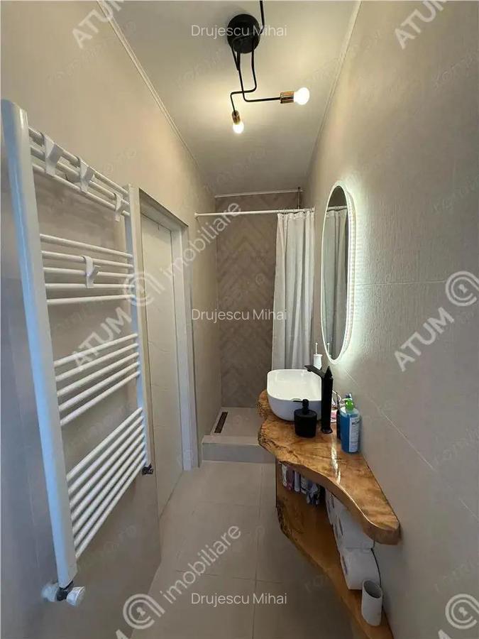 Casa cu 4 camere si 217 mp teren in zona Calea Cisnadie Sibiu - 12