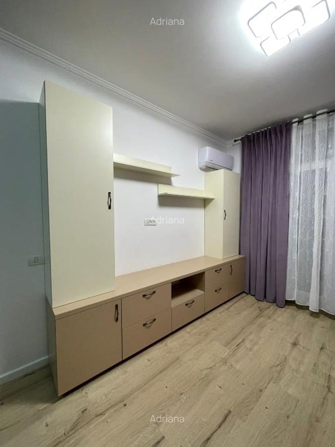 Inchiriez apartament + loc de parcare - 5