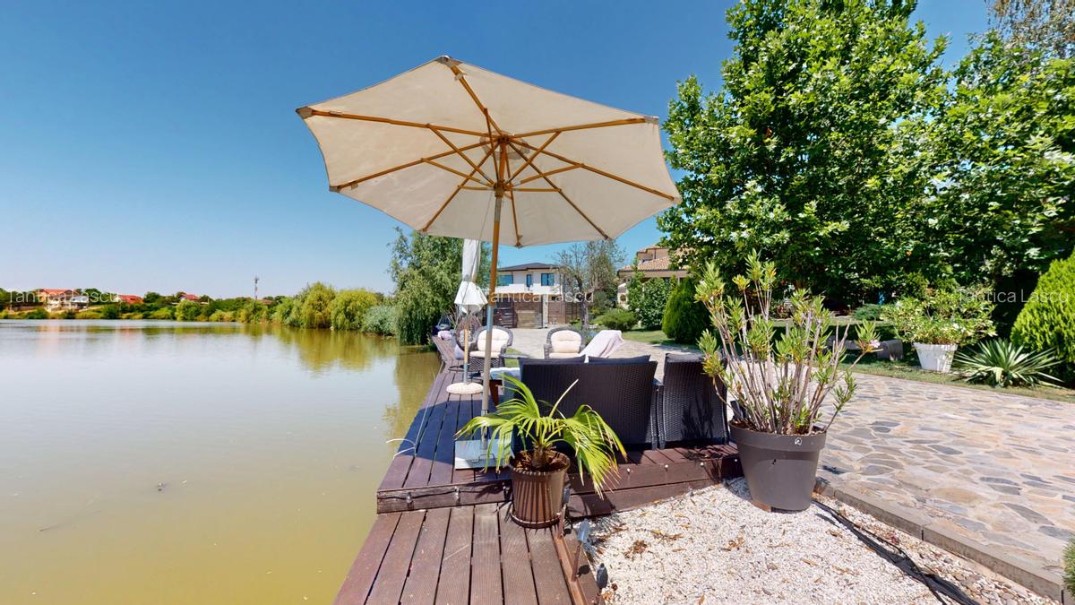 Imobil  de lux pe malul lacului cu ponton, complet mobilat si utilat - 10